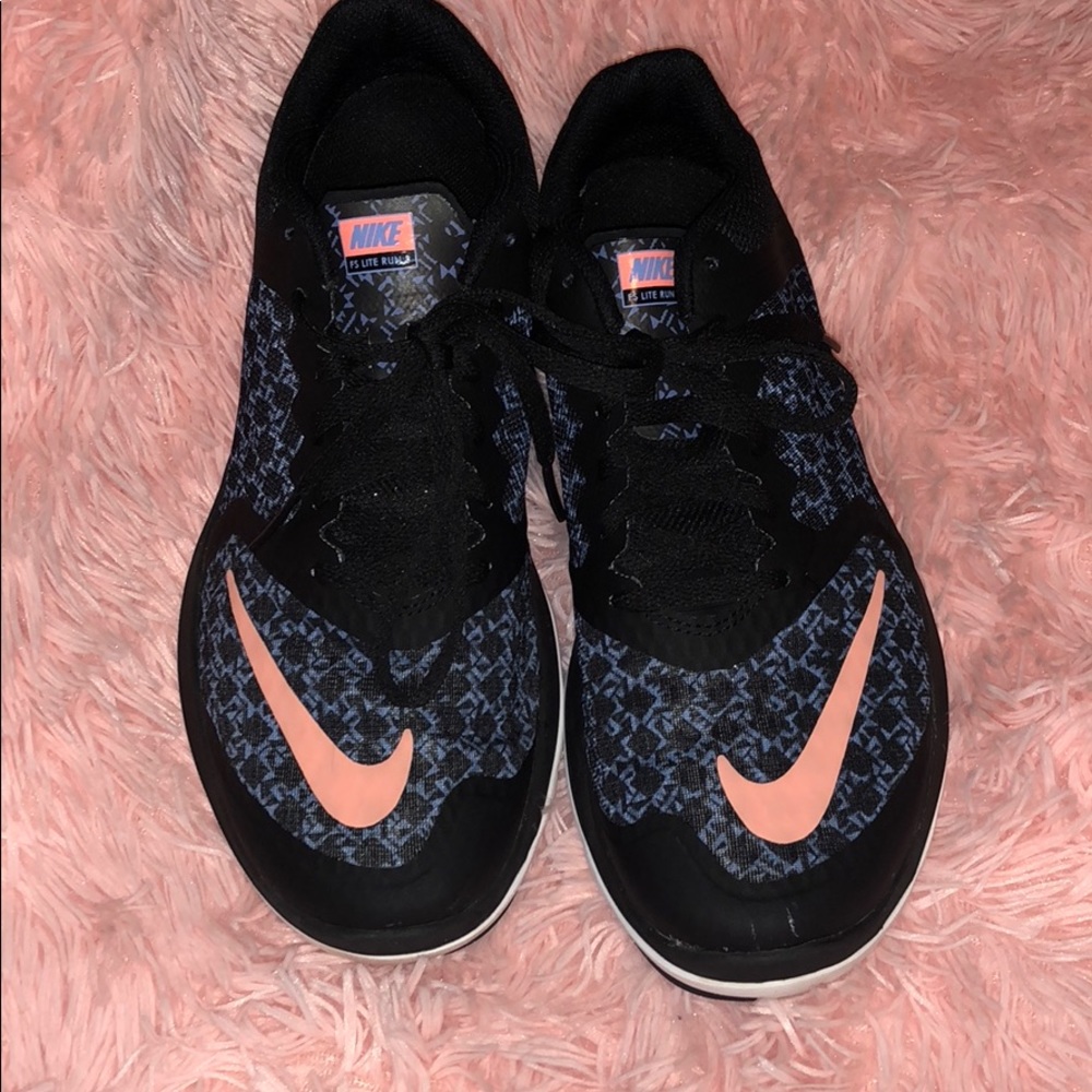 Pink and blue nike shoes